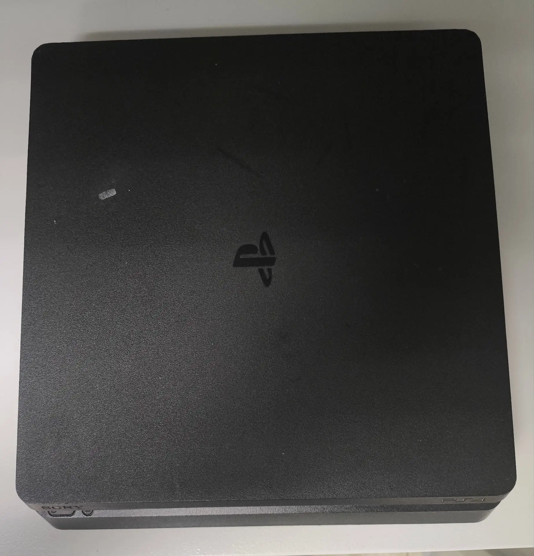 Игровая приставка Sony PlayStation 4 Slim 1Tb, чёрная-1