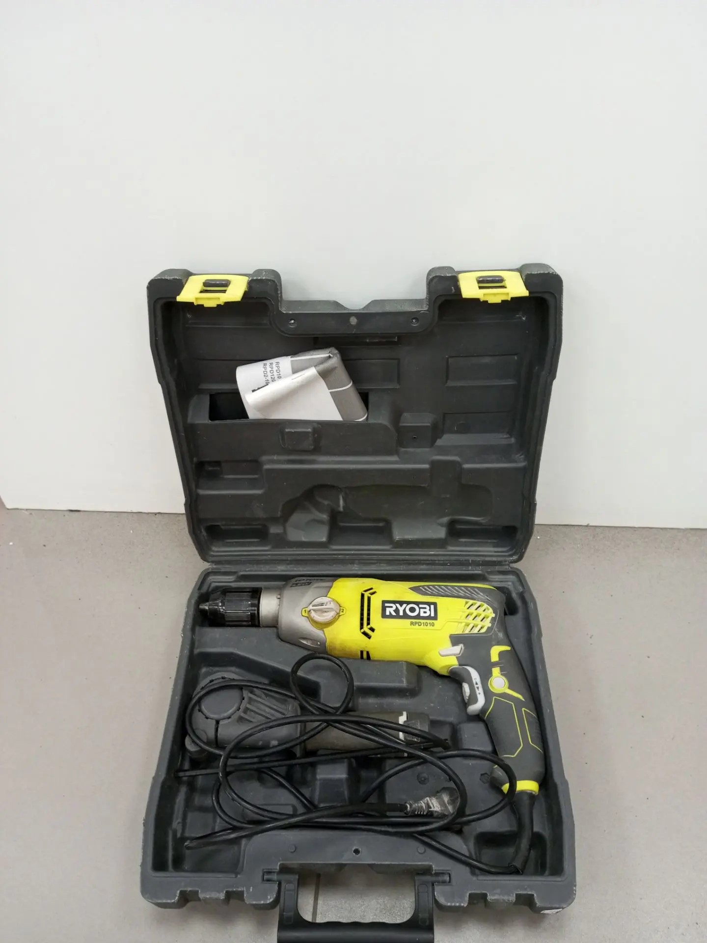 Ударная дрель RYOBI RPD1010, в комплекте кейс и ручка-1