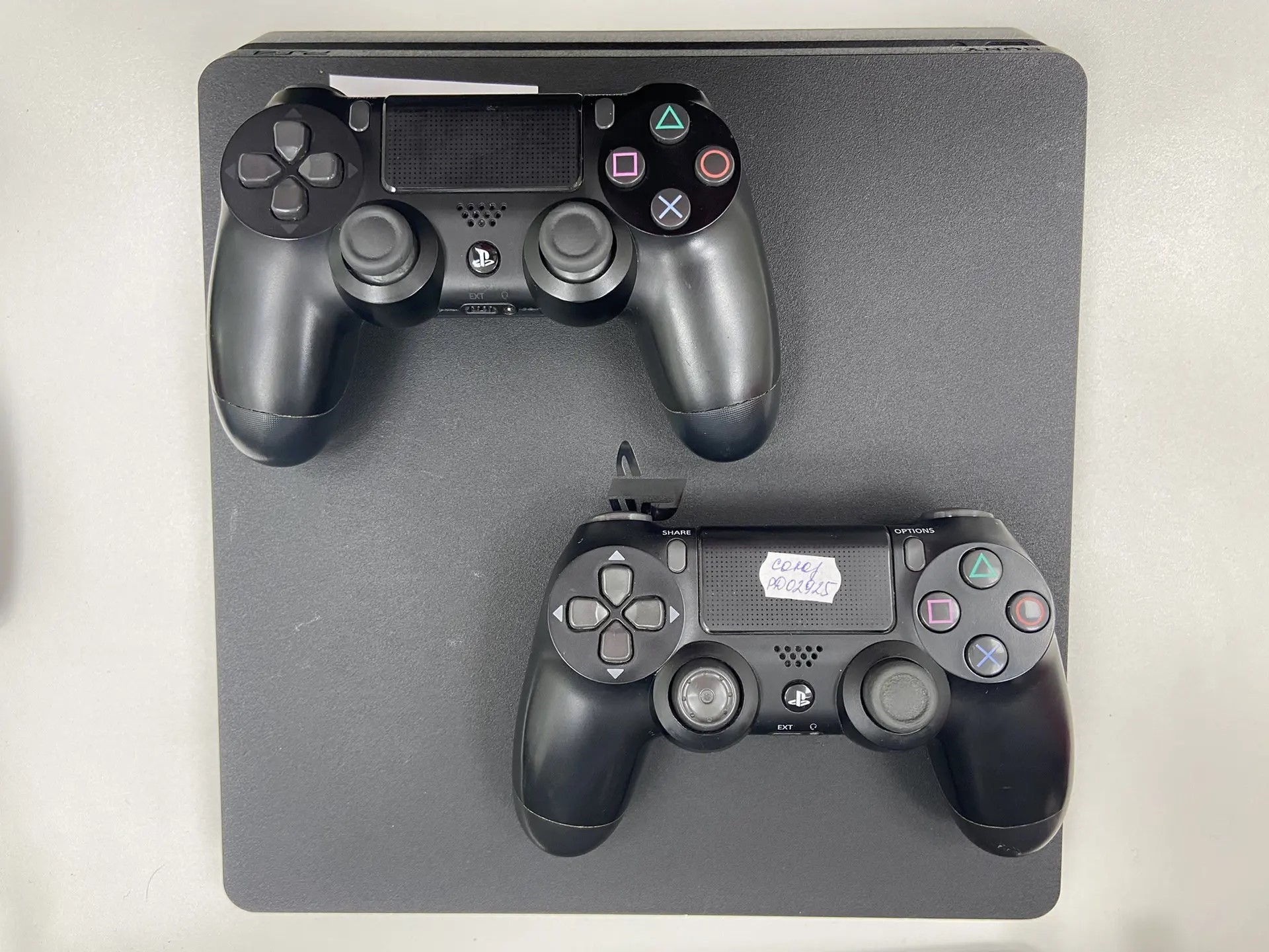 Игровая приставка Sony PlayStation 4 Slim 1Tb, черная